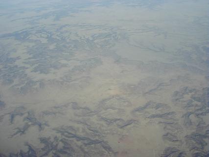 Canyons in New Mexico<br>Location: <a href="https://www.google.com/maps/search/?api=1&query=36.90726,-103.4658" target="_new">Over New Mexico</a>